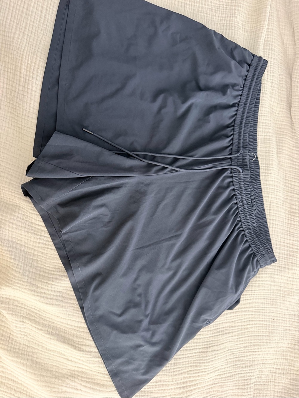 J. Jill Navy Athletic Elastic Waist Pull-On Shorts with a biker short lining.